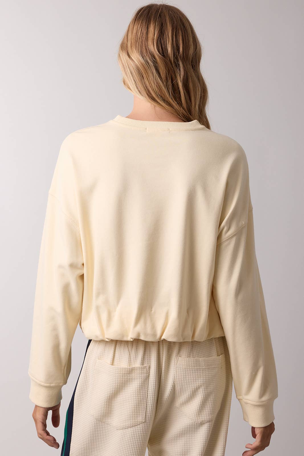BUBBLE HEM FRENCH TERRY TOP