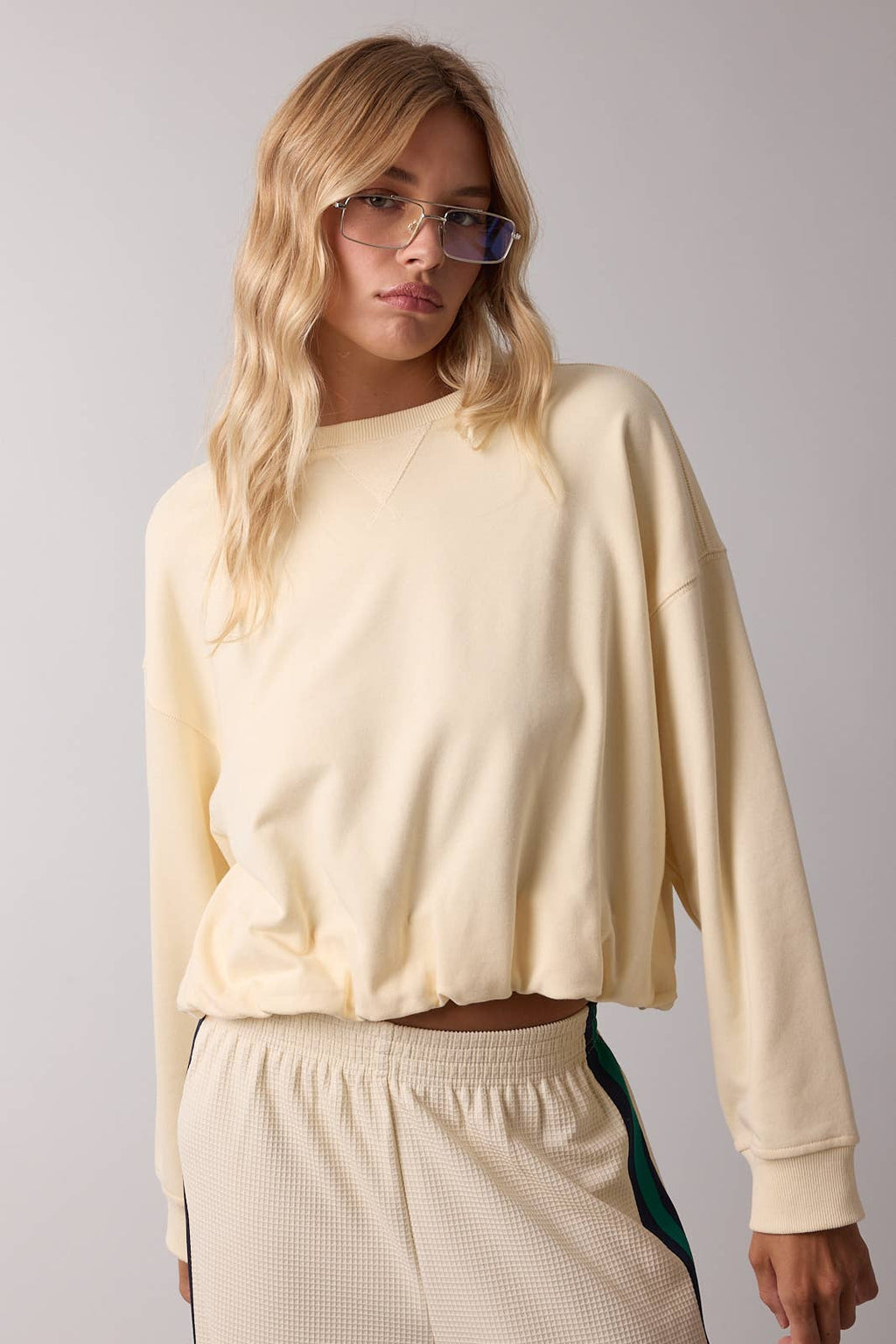 BUBBLE HEM FRENCH TERRY TOP