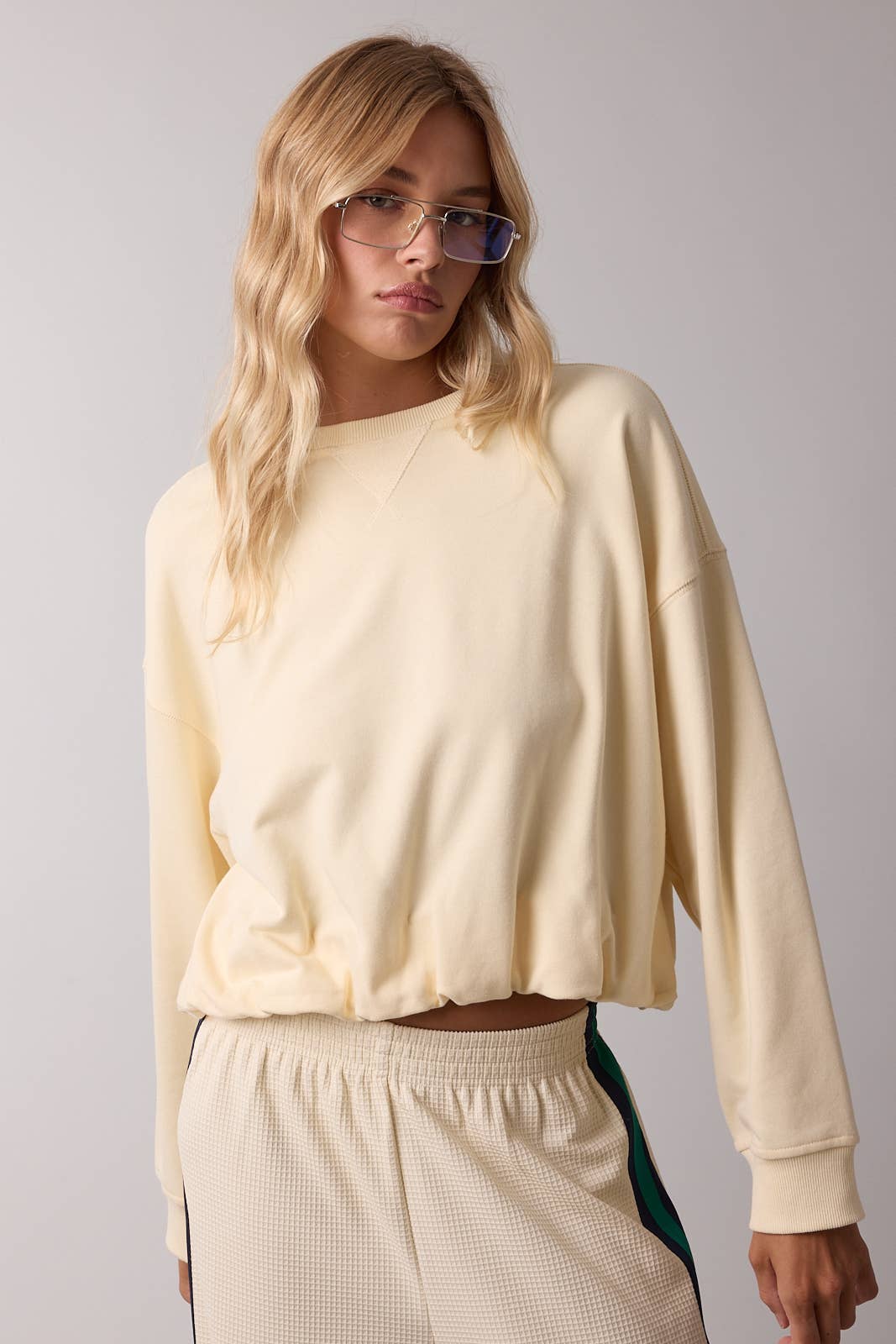 BUBBLE HEM FRENCH TERRY TOP